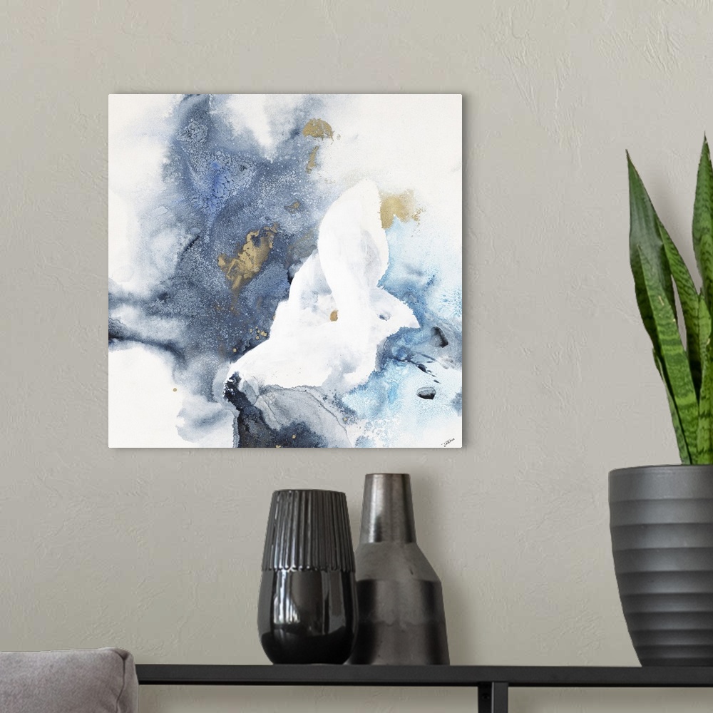 A modern room featuring A blue and gold watercolor painting of a flower in a meadow.