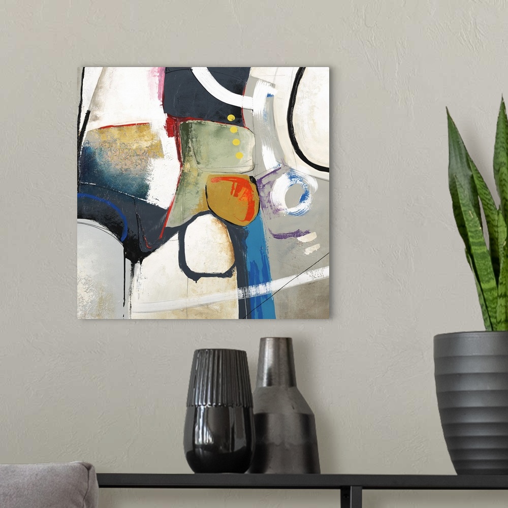 A modern room featuring Square abstract art created with shapes in various colors coming together in the center with a gr...