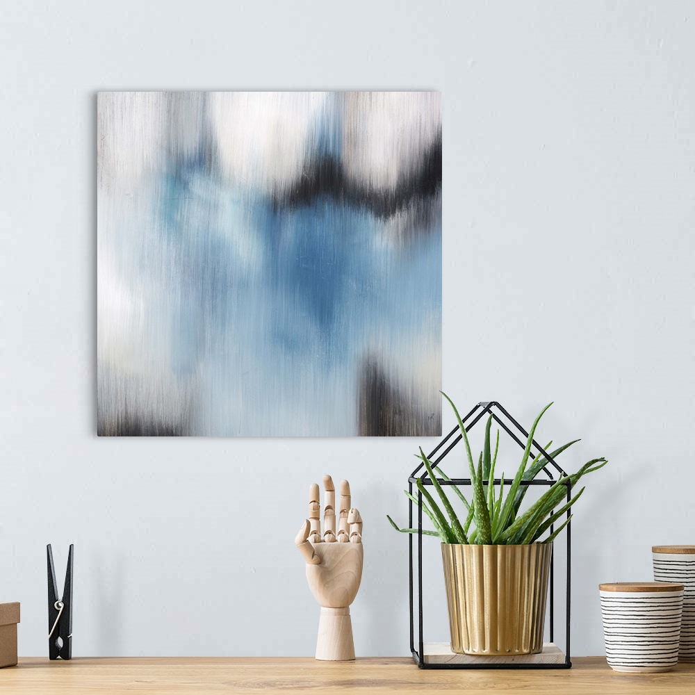 A bohemian room featuring Contemporary abstract painting using blue and gray tones in a vertically blurred motion.