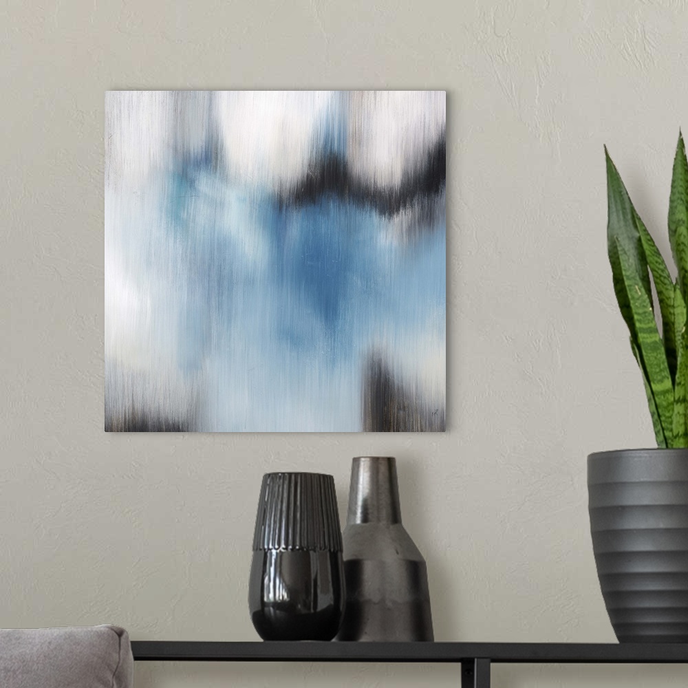 A modern room featuring Contemporary abstract painting using blue and gray tones in a vertically blurred motion.