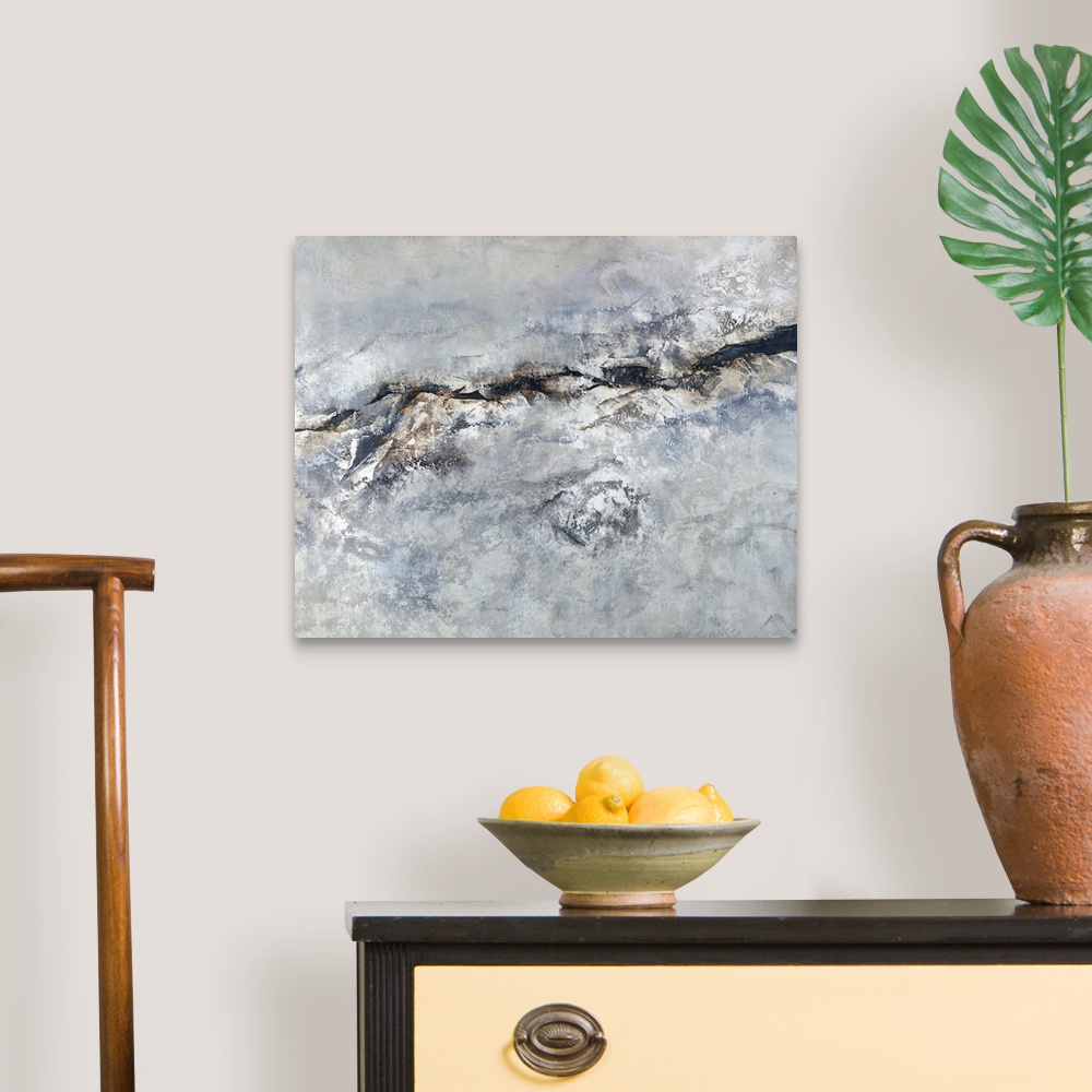 A traditional room featuring Contemporary abstract painting with shades of gray, silver, blue, and brown creating texture.