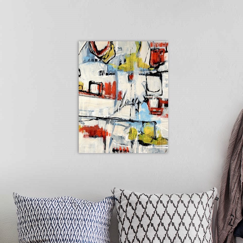 A bohemian room featuring Abstract painting of lines and blotches of various colors on an off white canvas.