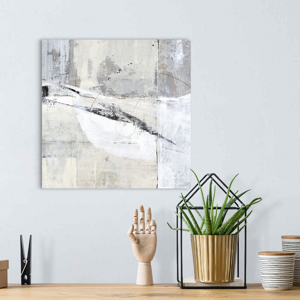 A bohemian room featuring Square contemporary abstract painting with sections of gray, white, and tan hues with thin, black...