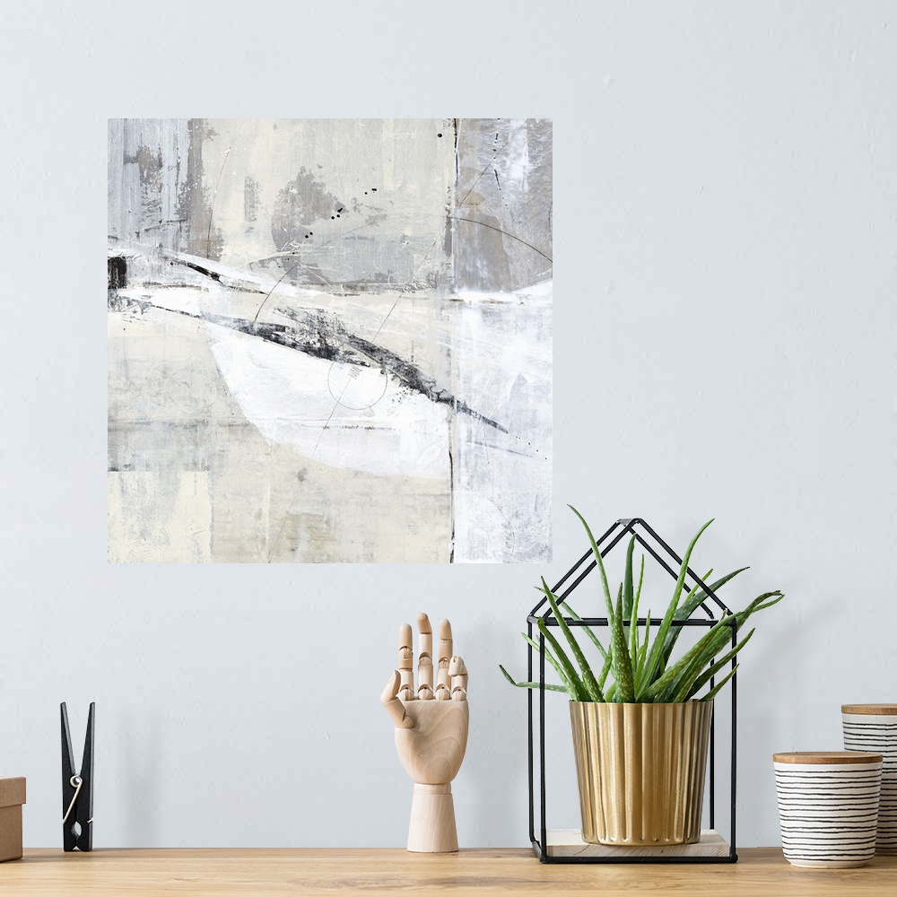 A bohemian room featuring Square contemporary abstract painting with sections of gray, white, and tan hues with thin, black...