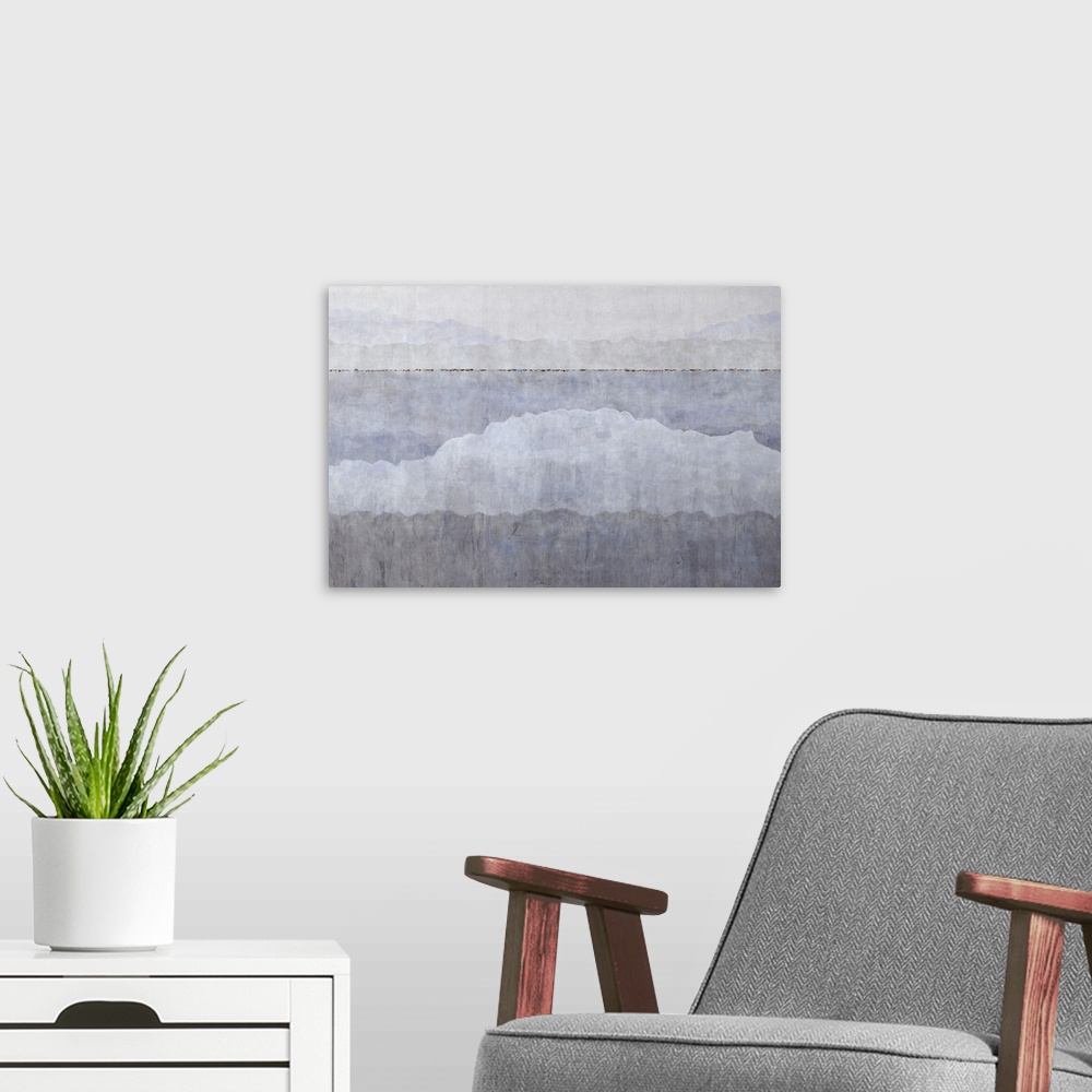 A modern room featuring A subdue artwork of varies tones of gray of a coastal landscape, with the reflection of mountains...