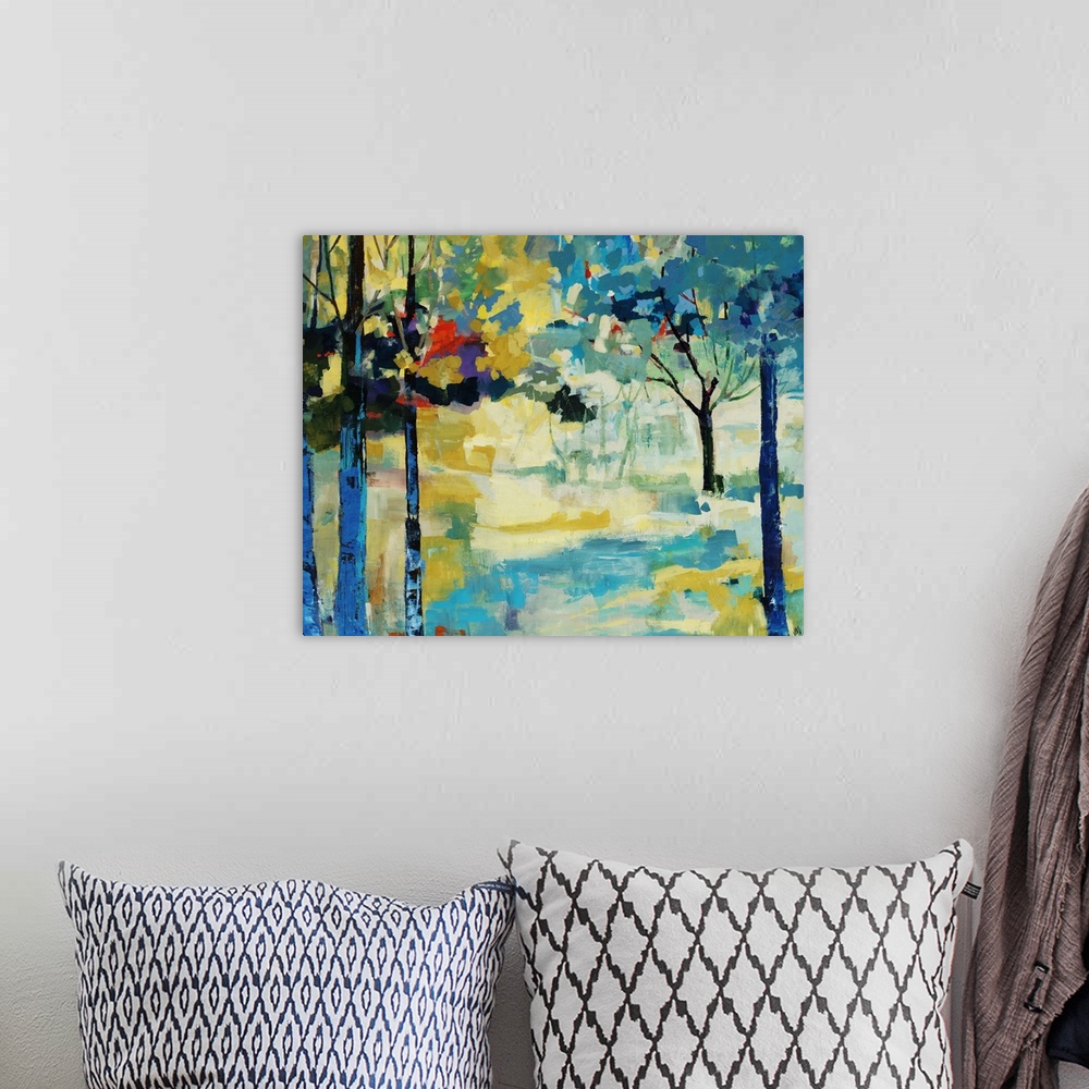 A bohemian room featuring Contemporary painting of a vibrant path surrounded on either side by a forest of colorful trees a...