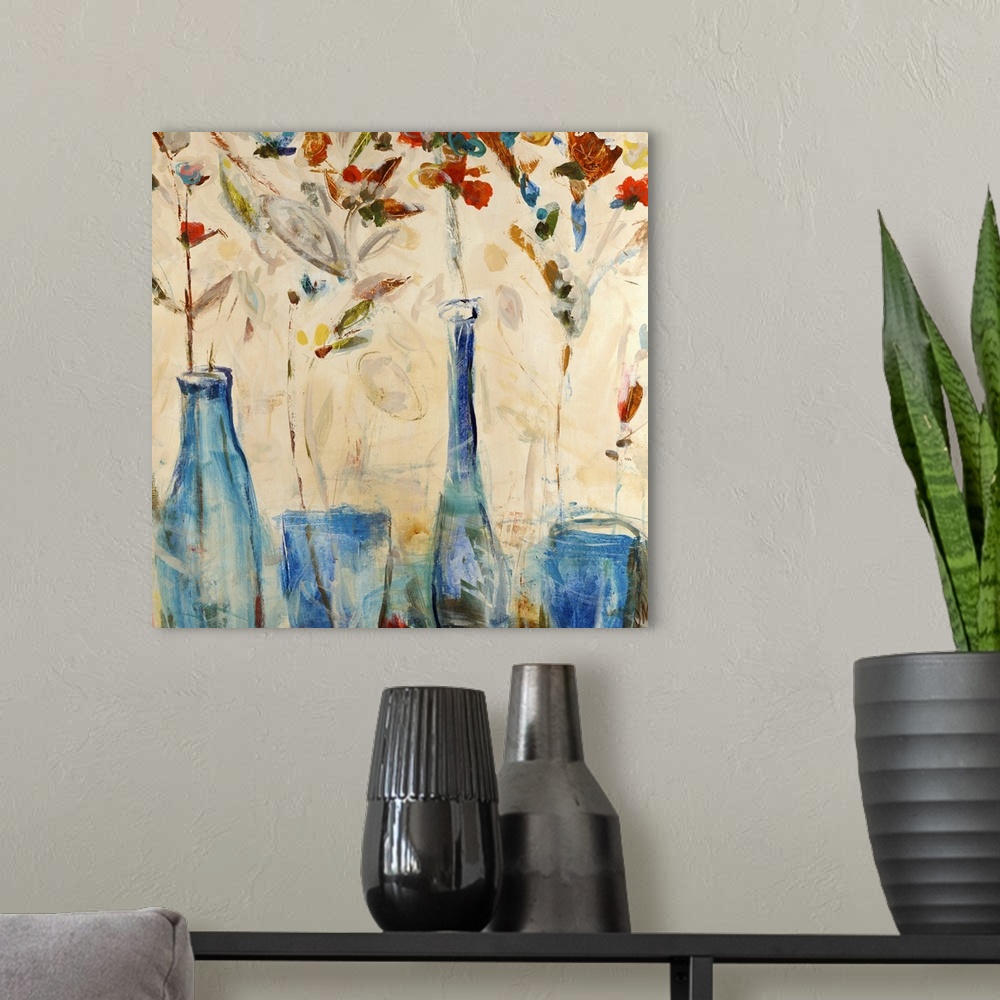 A modern room featuring Blue vases line the bottom of the artwork as tall colorful flowers sprout from them.