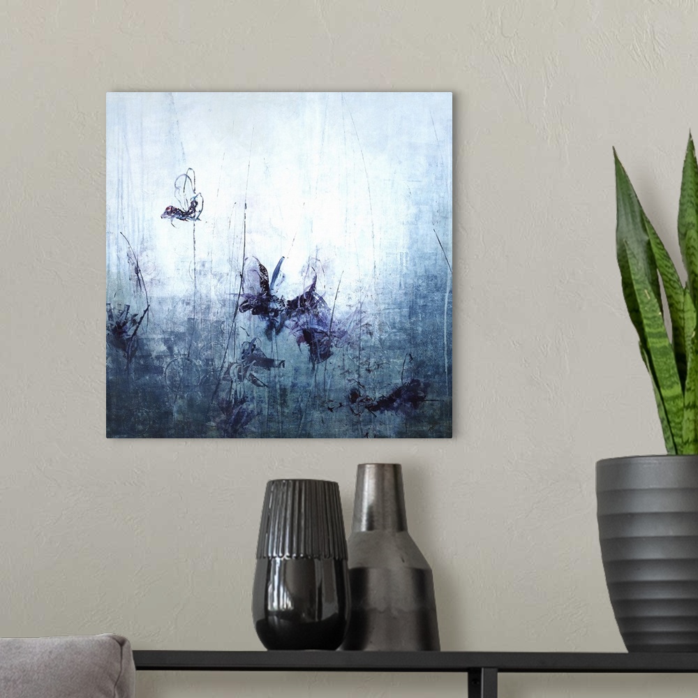 A modern room featuring Square abstract art in shades of blue with dark purple floral looking designs.