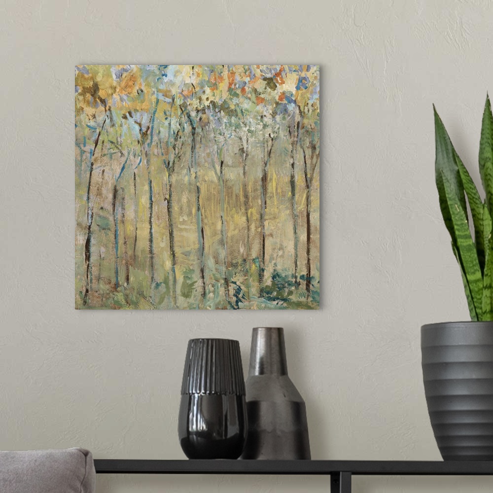 A modern room featuring Contemporary artwork of a forest of thin trees with colorful leaves.