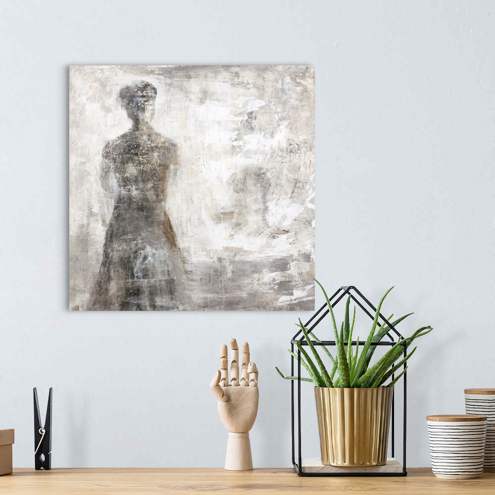 A bohemian room featuring Contemporary abstract painting using dark neutral tones and a smokey form.