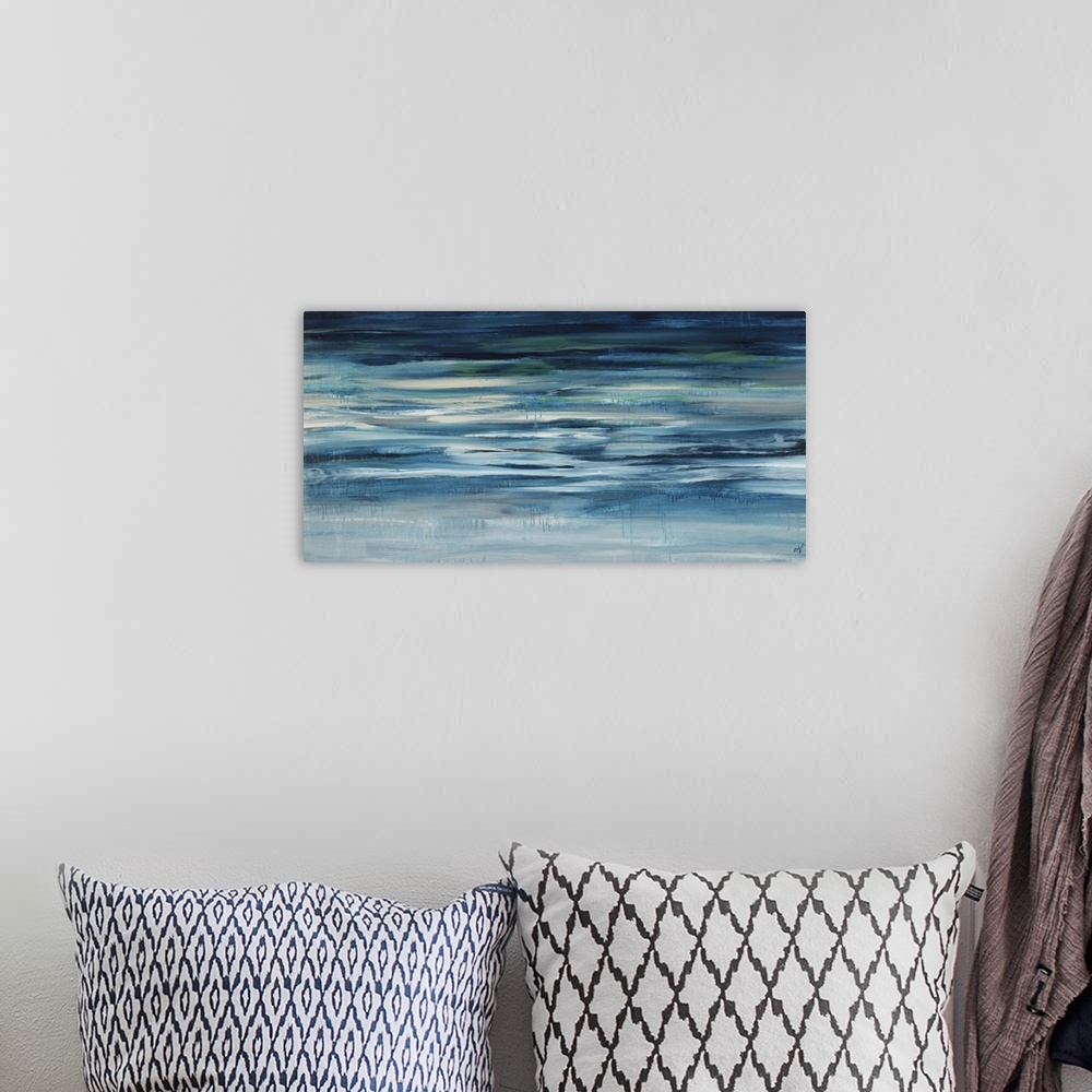 A bohemian room featuring Contemporary abstract painting of teal and light blue colored waterscape.