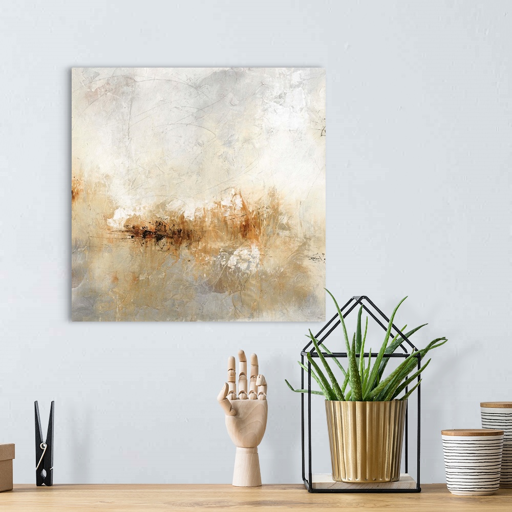 A bohemian room featuring Square abstract painting in neutral colors with thin black markings on top.
