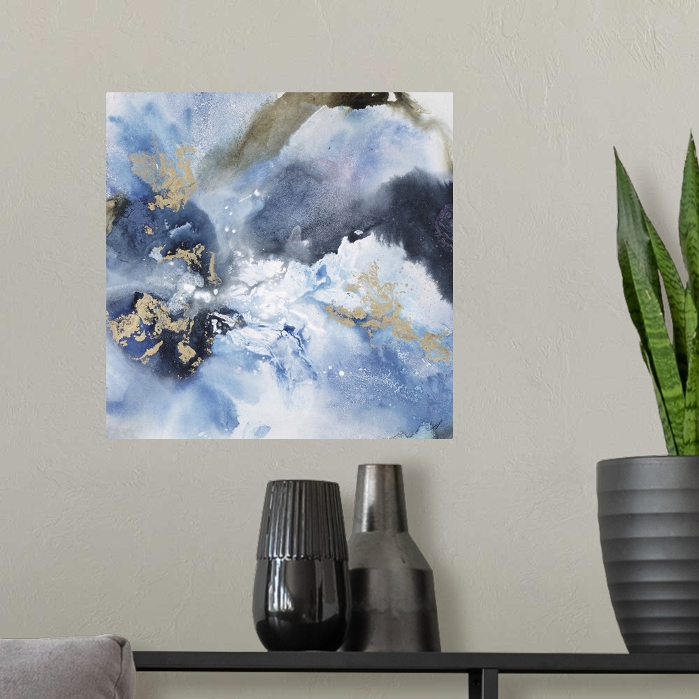 A modern room featuring Abstract contemporary painting in blue and gold tones, resembling a cloudy sky.