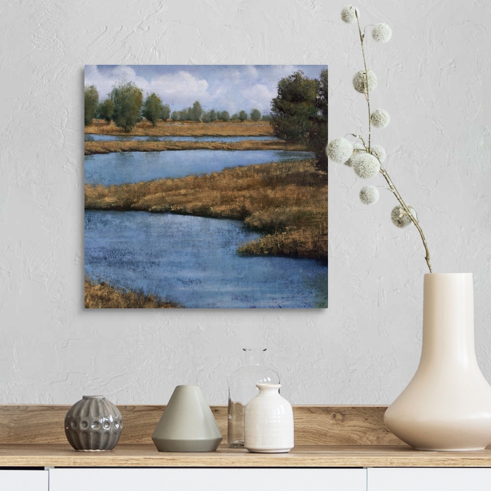A farmhouse room featuring Contemporary painting of an idyllic countryside landscape, with a winding river.
