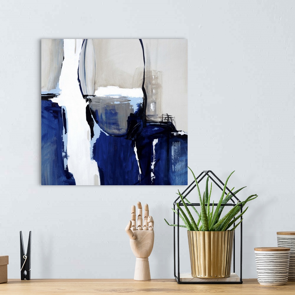 A bohemian room featuring Contemporary abstract painting using dark blue, white and gray tones.