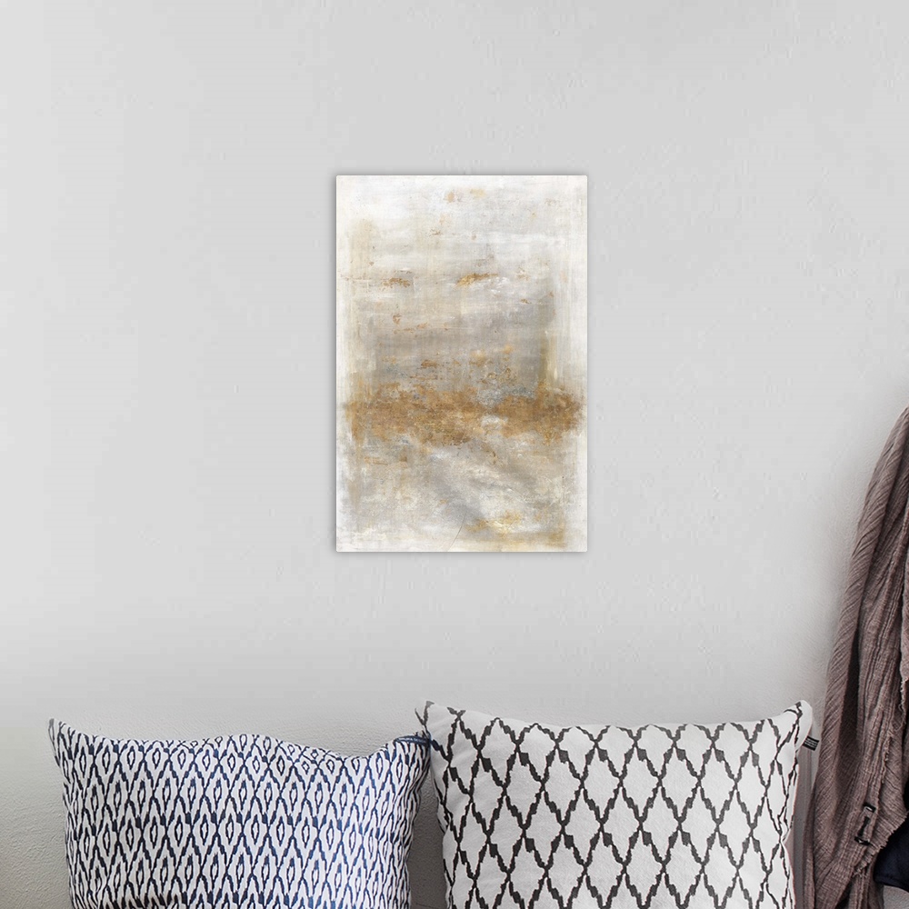 A bohemian room featuring Large abstract artwork with a gray and white background and metallic gold on top.