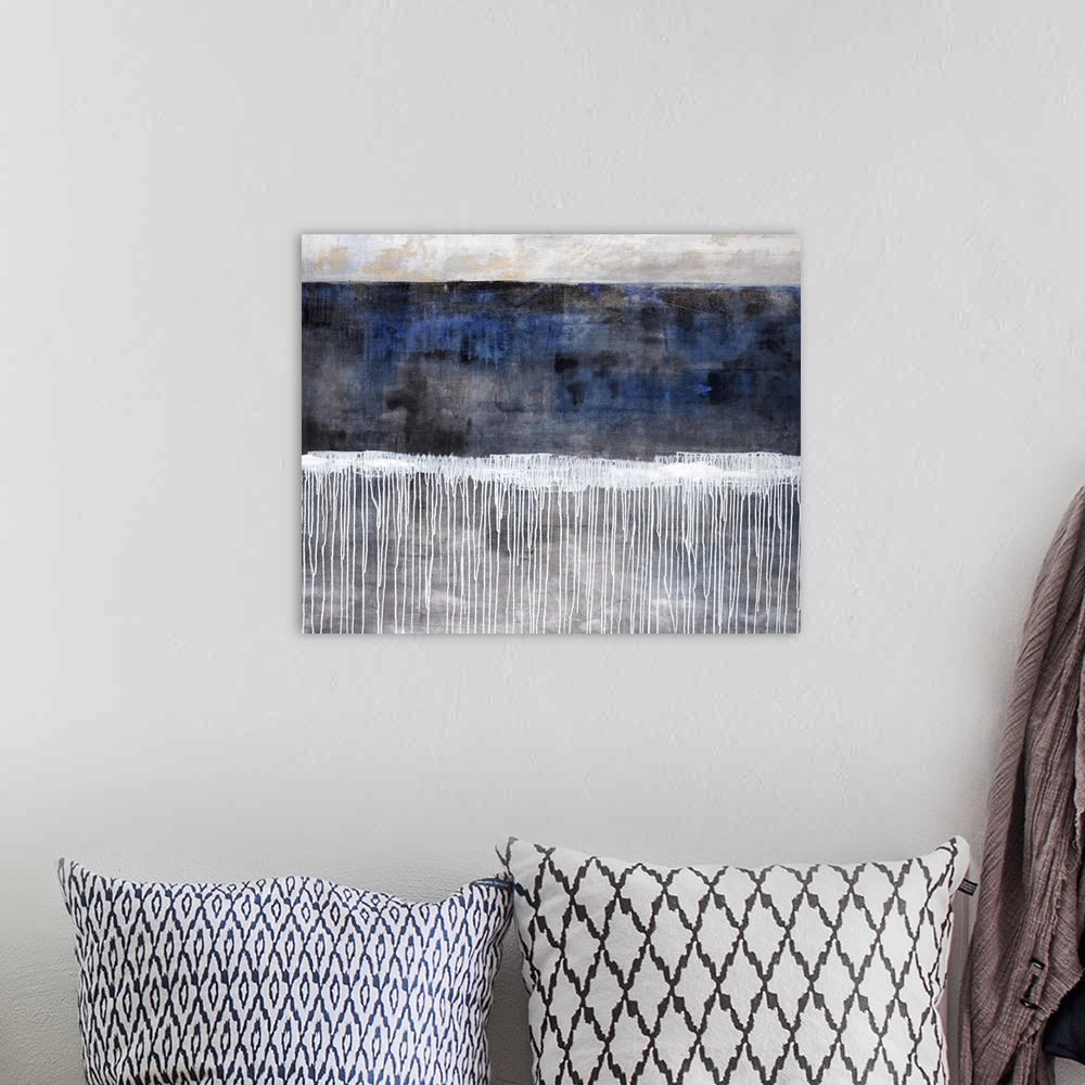 A bohemian room featuring Contemporary abstract painting of a blue background with a line of white paint in the middle of t...