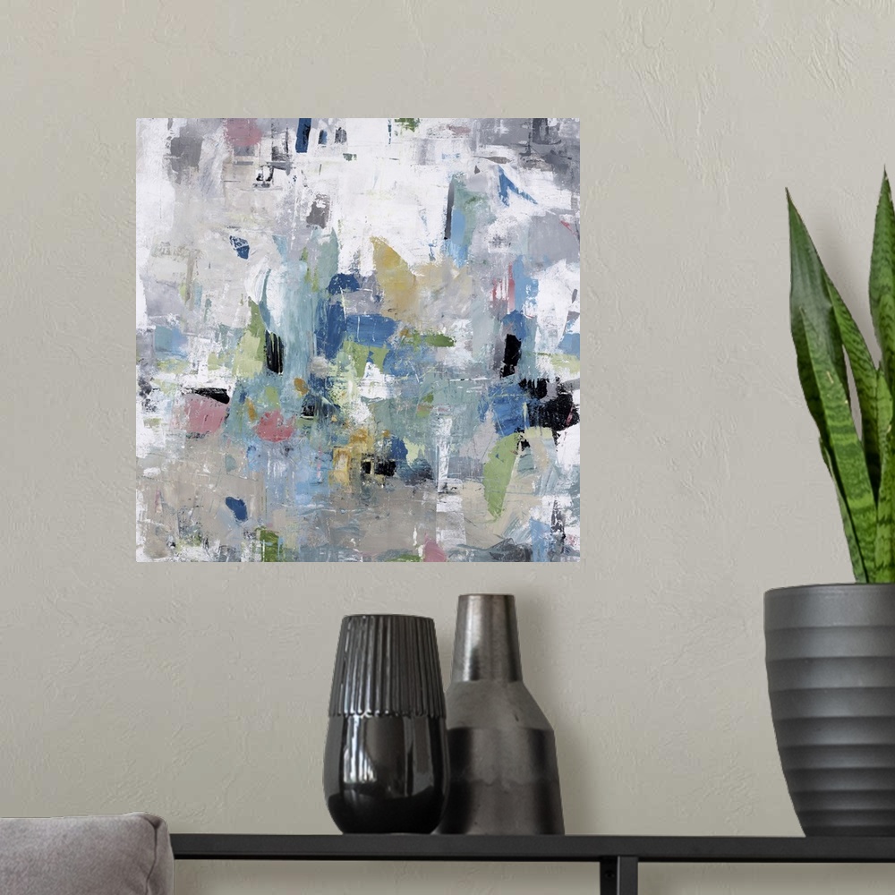 A modern room featuring Abstract painting of textured brush strokes with blue and red accents.