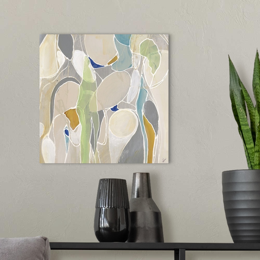 A modern room featuring Abstract painting of rounded shapes and sections of various soft tones divided by thin white line...