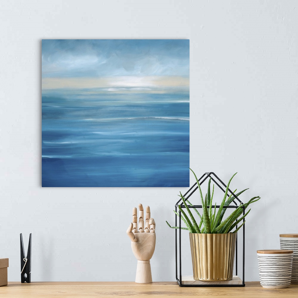A bohemian room featuring Contemporary seascape painting of a cool, calm blue ocean view.
