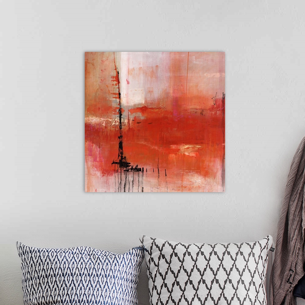 A bohemian room featuring Abstract painting of deep red and pale red tones, with a harsh black stroke off to the left.