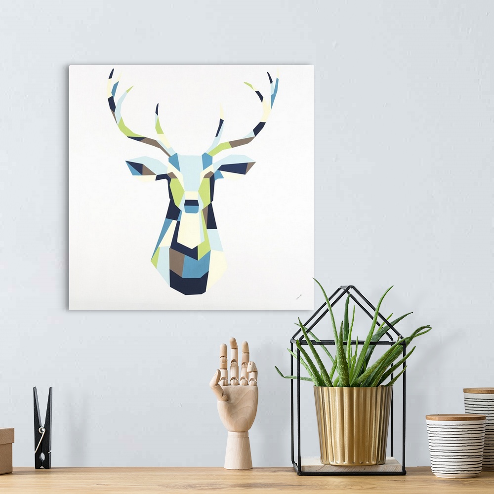 A bohemian room featuring Painting of a deer with antlers using geometric colored shapes.