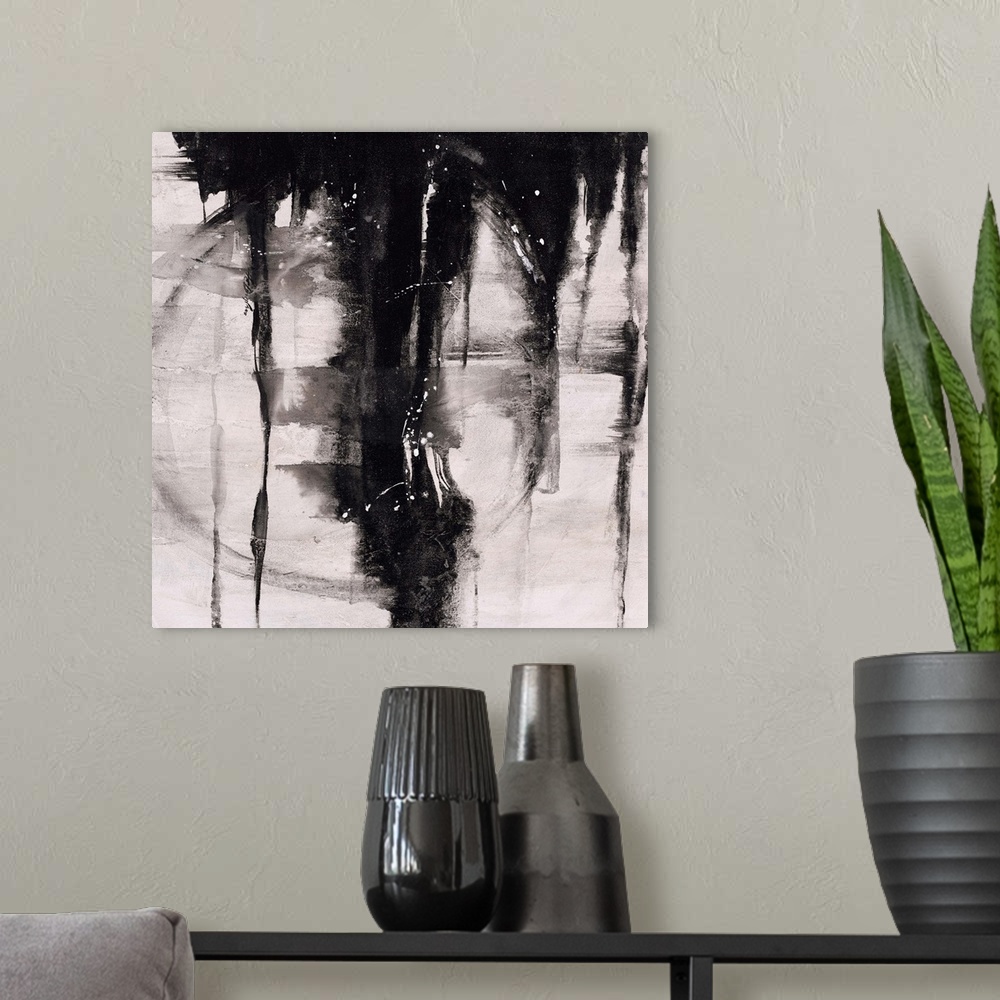 A modern room featuring Abstract painting using black paint dripping down from top of image, against a gray toned backgro...