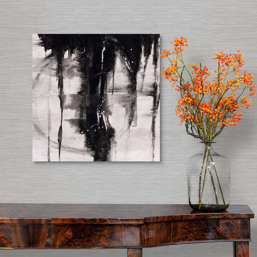 A traditional room featuring Abstract painting using black paint dripping down from top of image, against a gray toned backgro...