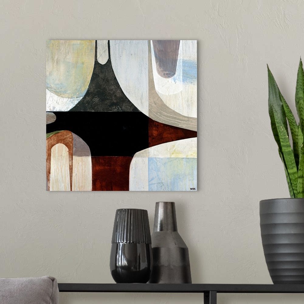 A modern room featuring Contemporary and abstract painting of shapes arranged together to make one large composition.  Ea...