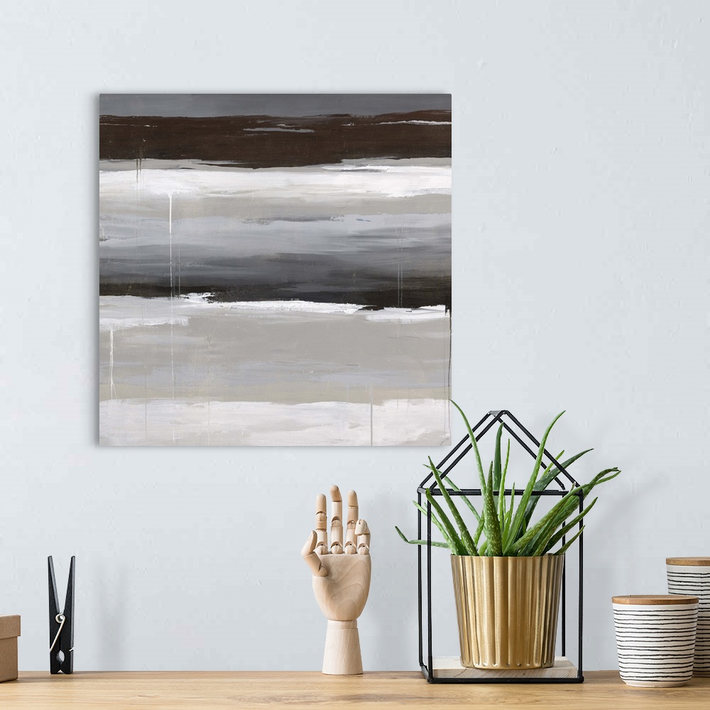 A bohemian room featuring Abstract painting using earth tones in horizontal stripes.