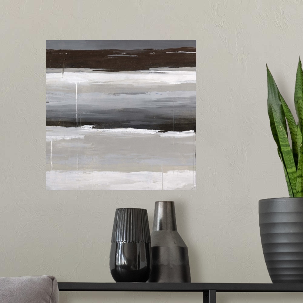 A modern room featuring Abstract painting using earth tones in horizontal stripes.