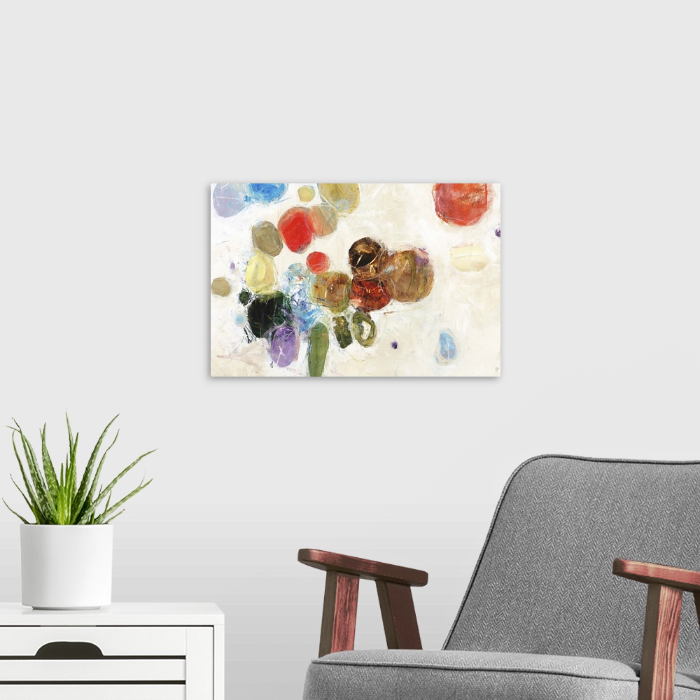 A modern room featuring Contemporary abstract painting of several colorful circular shapes against white.