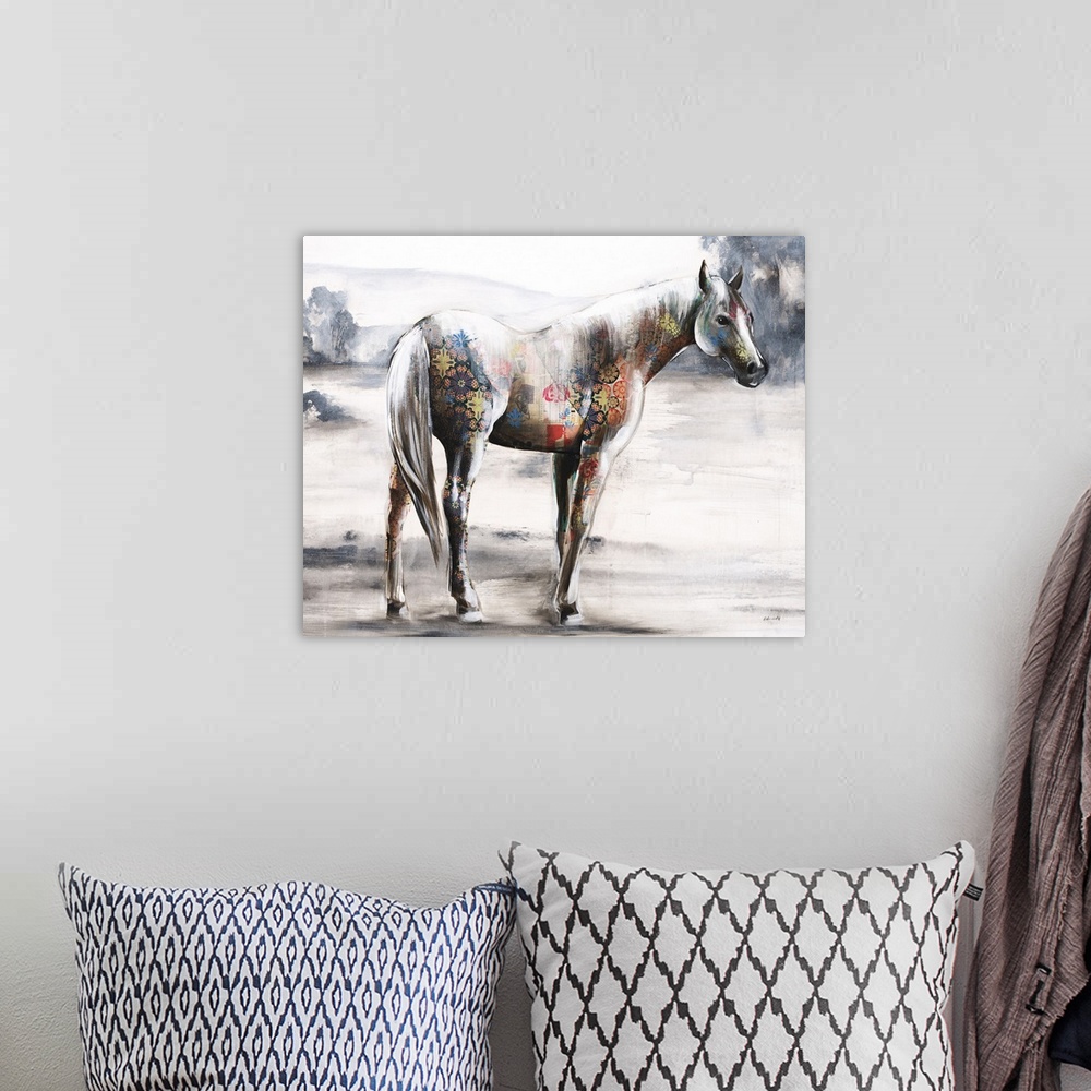 A bohemian room featuring Contemporary artwork of a horse in a field created with colorful patterns made with mixed media.