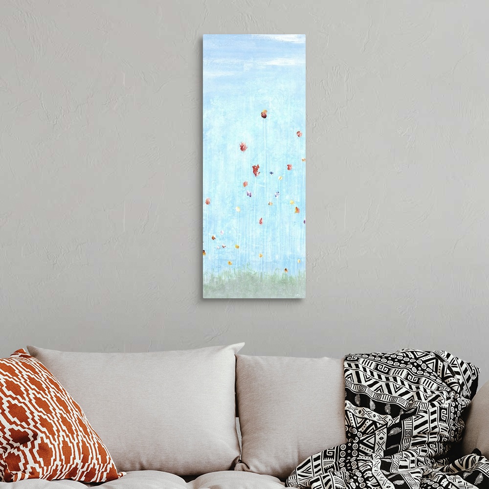 A bohemian room featuring Large panel painting of tall flowers on faint white stems coming up from faded green grass and li...