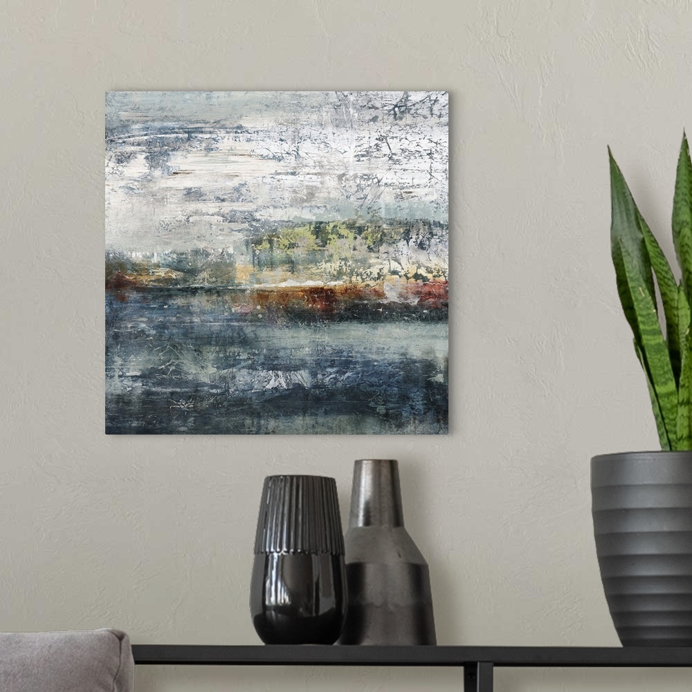 A modern room featuring Square abstract artwork with horizontal layers of color with a rough textured look.