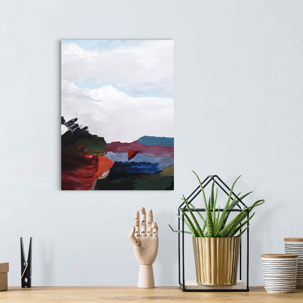 A bohemian room featuring Contemporary abstract painting with deep red and blue, with pale white above, resembling clouds o...