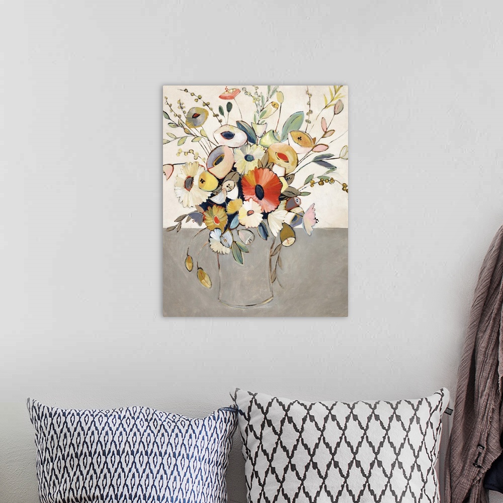 A bohemian room featuring A contemporary painting of a colorful bouquet of flowers.