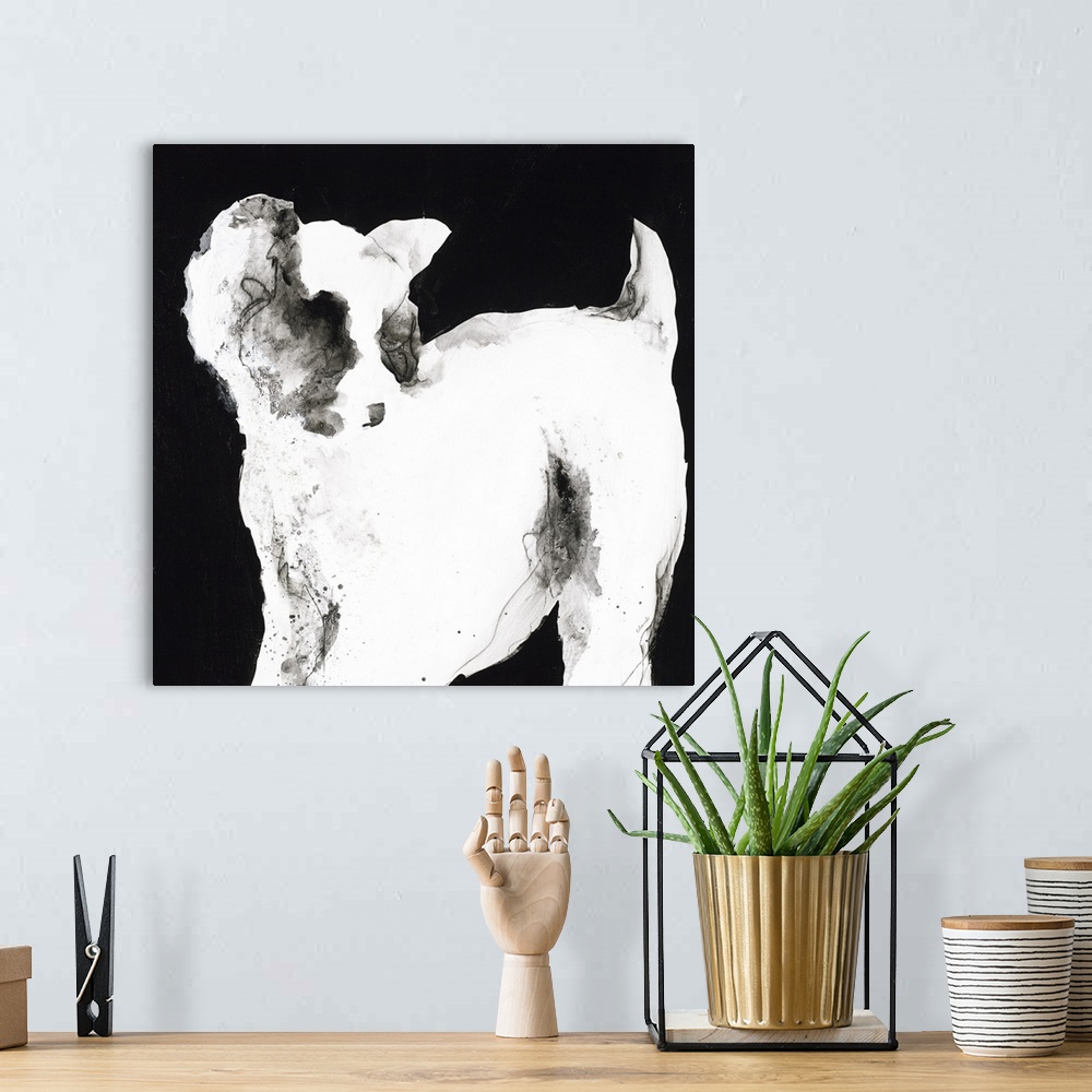 A bohemian room featuring White and gray silhouette of a puppy on a black, square background.
