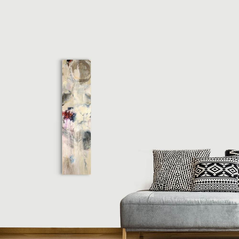 A bohemian room featuring A very tall panoramic abstract piece that uses lots of neutral colors with a few pops of red.