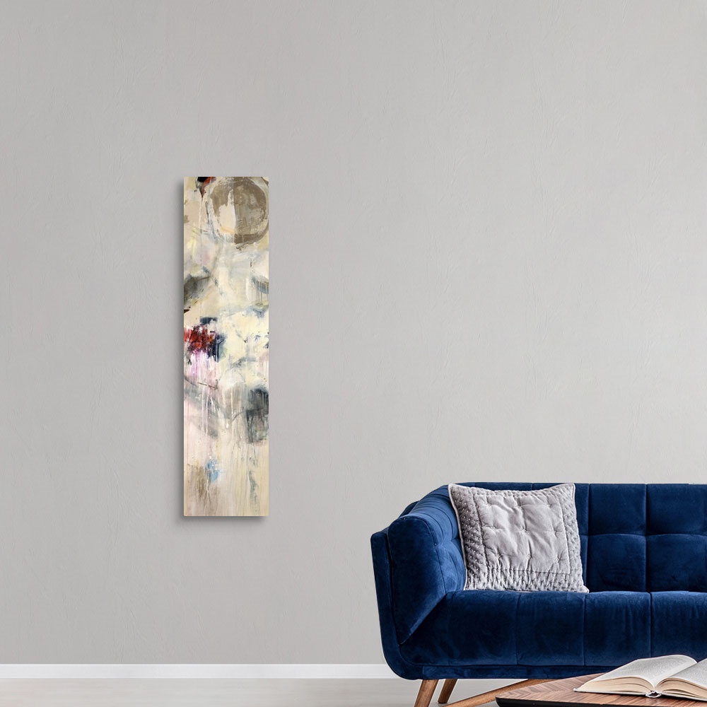 A modern room featuring A very tall panoramic abstract piece that uses lots of neutral colors with a few pops of red.