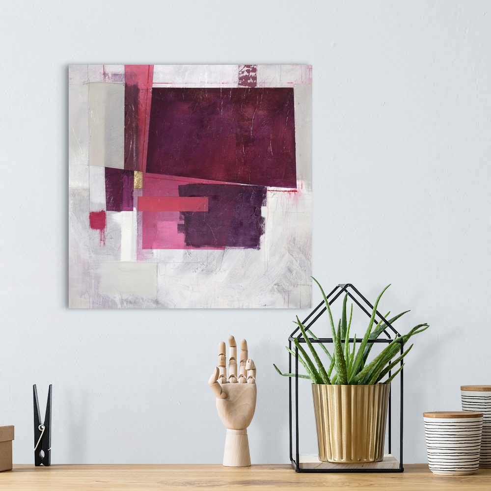 A bohemian room featuring Square abstract painting with rectangular shapes in shades of pink and purple with a single metal...