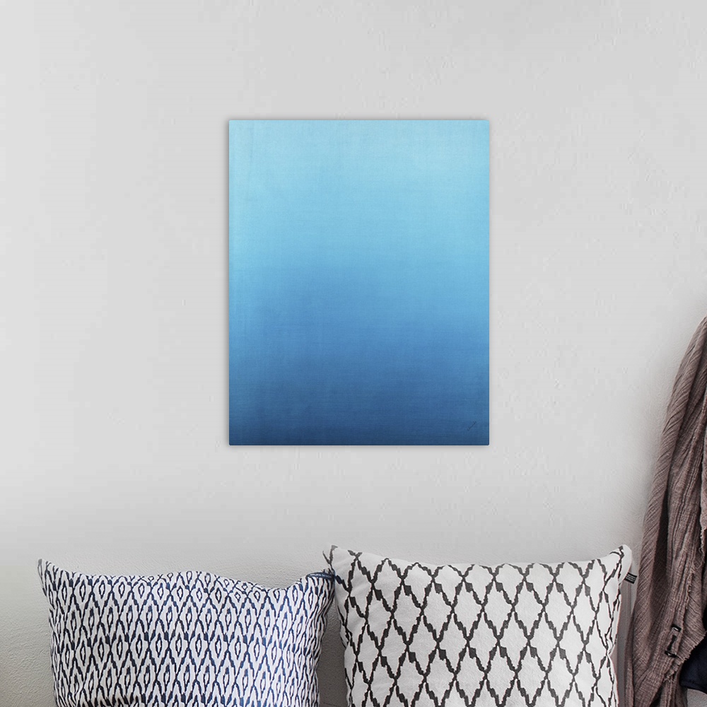 A bohemian room featuring Contemporary painting of lblue fading into a lighter shade.