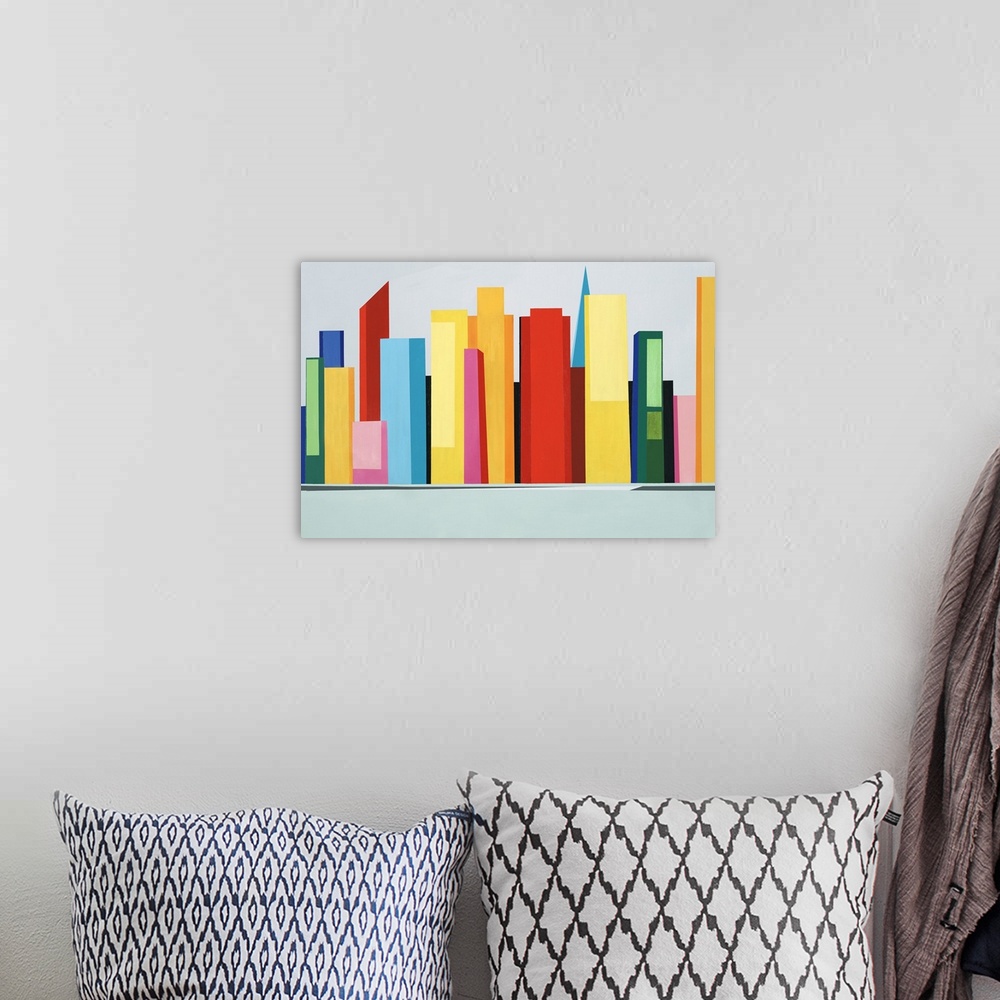 A bohemian room featuring Large abstract artwork of a colorful city skyline created with large geometric shapes.