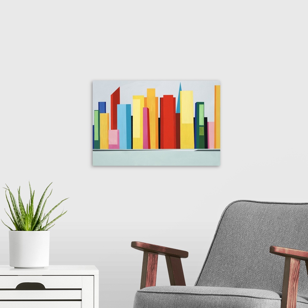A modern room featuring Large abstract artwork of a colorful city skyline created with large geometric shapes.