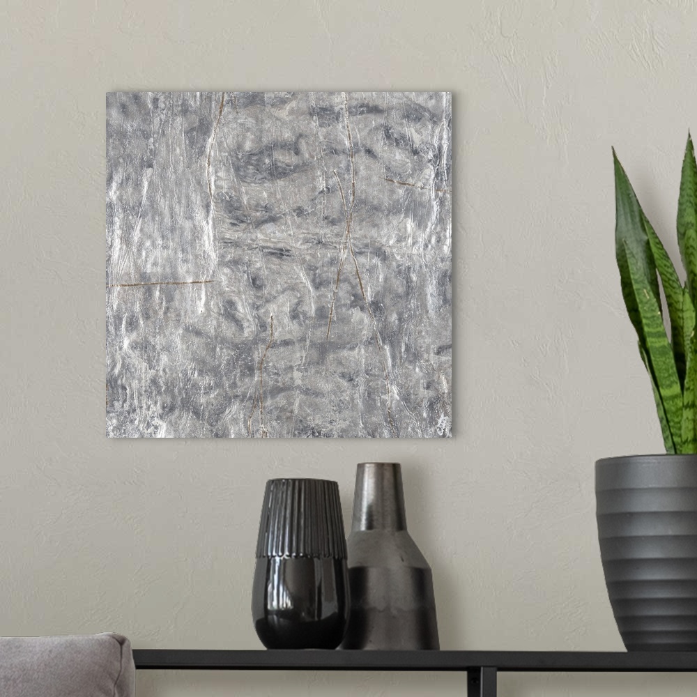 A modern room featuring A textured abstract painting in shades of silver with faint brown lines throughout.
