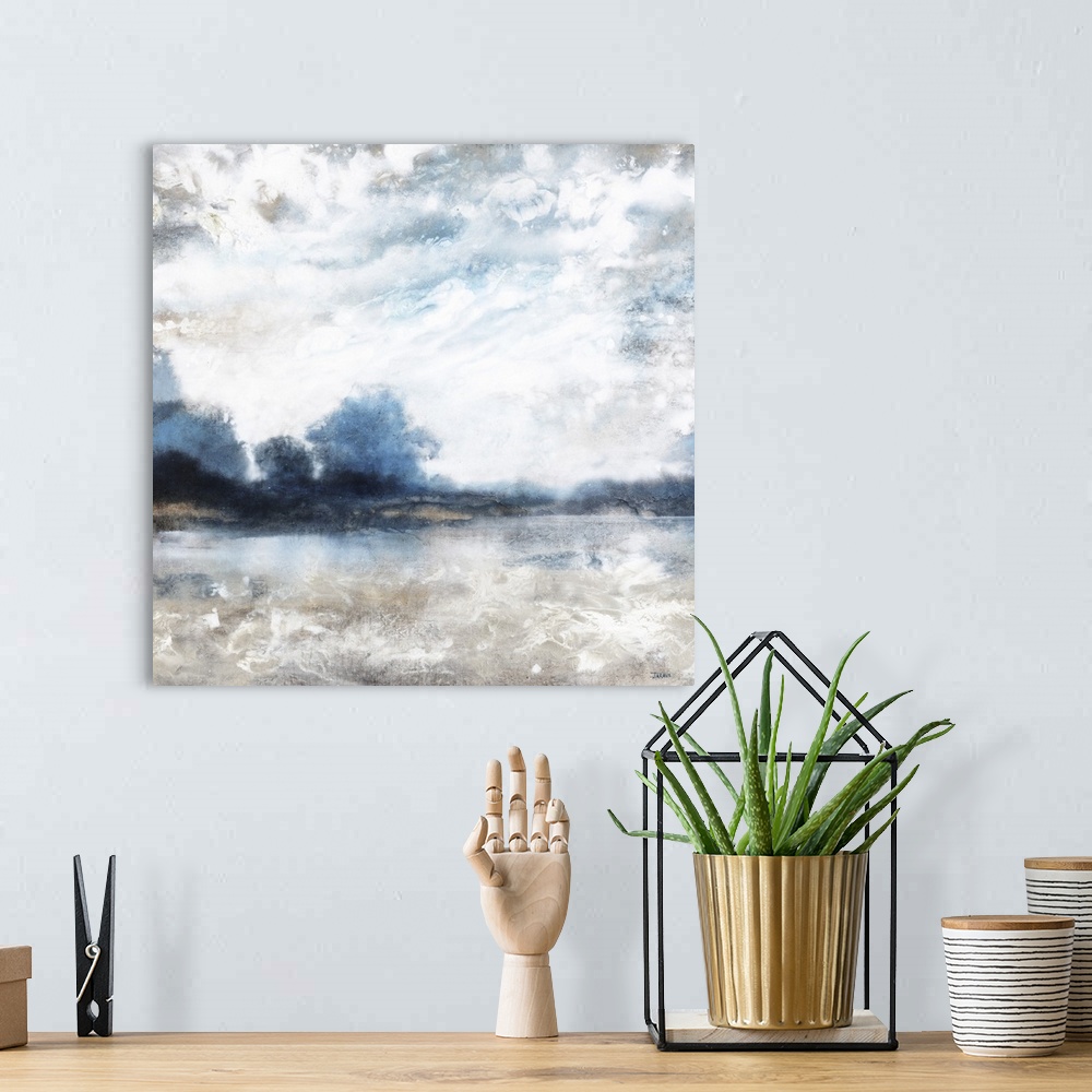 A bohemian room featuring Square abstract landscape painting of a tree line on the horizon in shades of blue and white, bro...