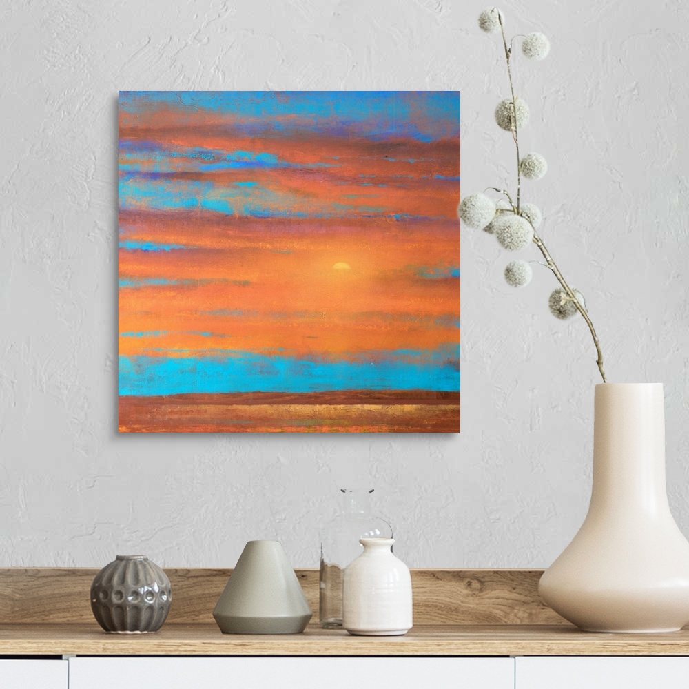 A farmhouse room featuring A piece of contemporary artwork that is of a sunset with orange clouds painted on top of a bright...