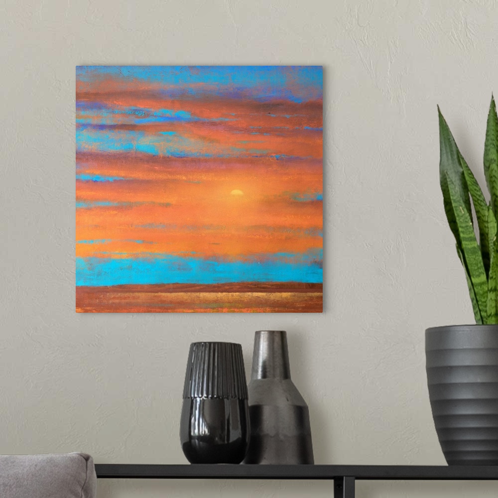 A modern room featuring A piece of contemporary artwork that is of a sunset with orange clouds painted on top of a bright...