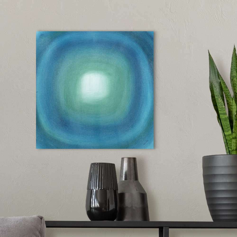 A modern room featuring Square abstract with with a blue gradient circle moving out from the white center towards the edg...