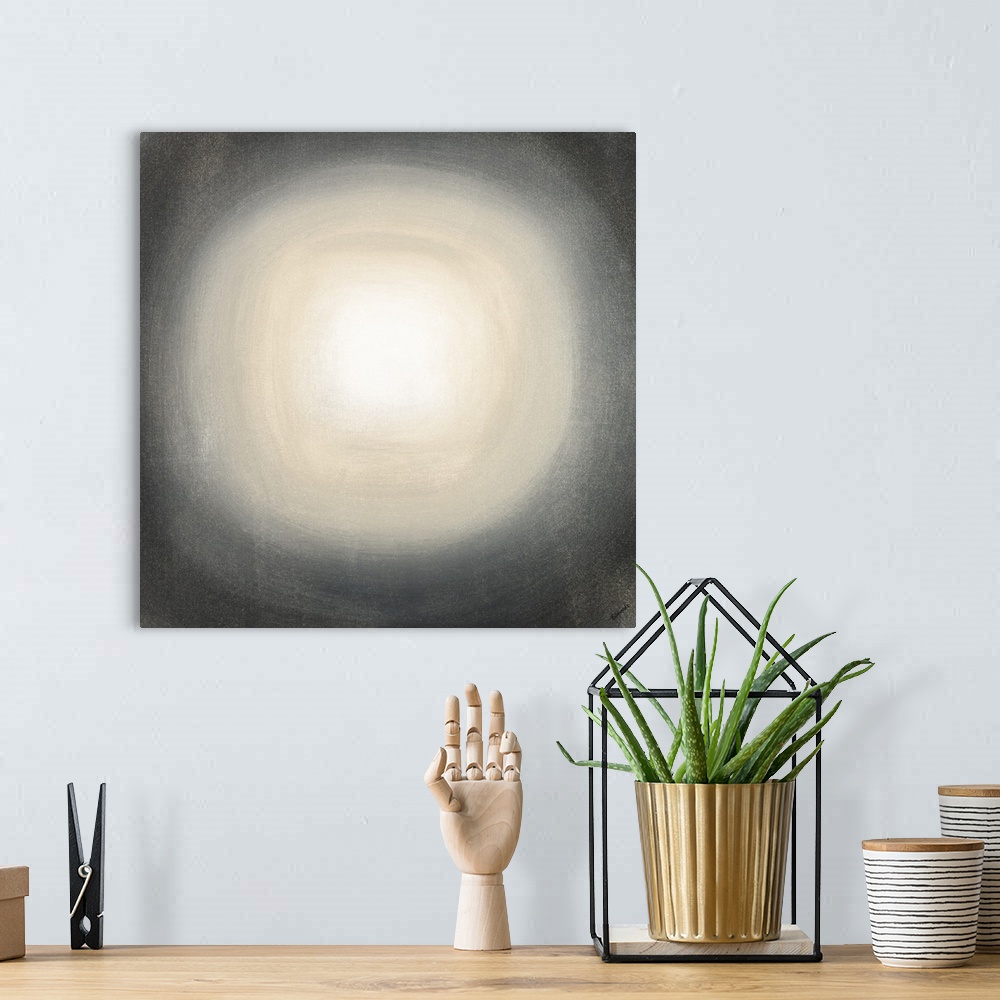 A bohemian room featuring Square abstract with with a tan and black gradient circle moving out from the white center toward...